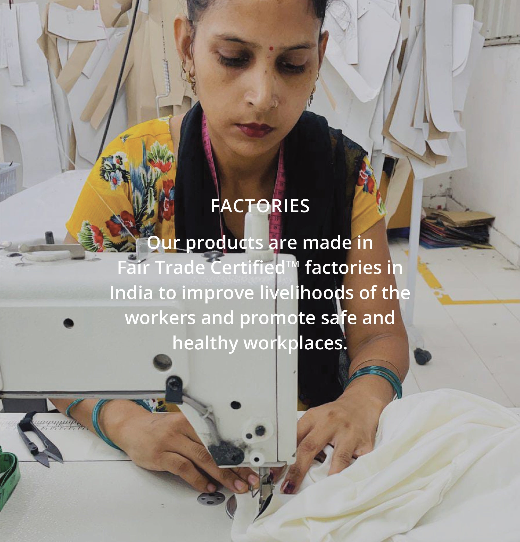 Woman working at a sewing machine with text about Fair Trade certified factories in India.