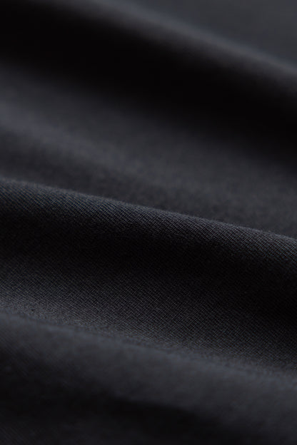 Close-up of black organic cotton t-shirt