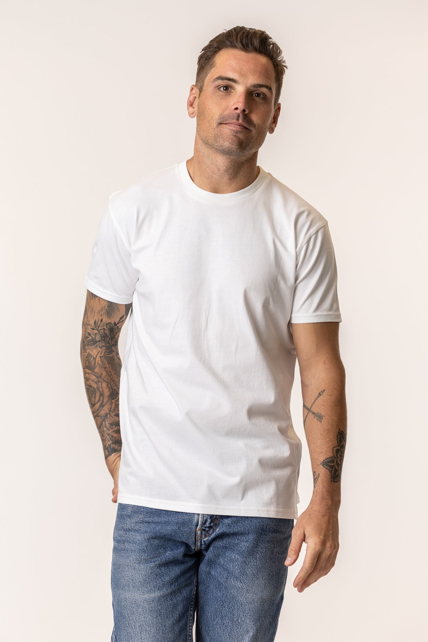 Man wearing a plain white t-shirt