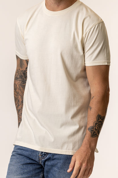 Person wearing a natual organic cotton t-shirt