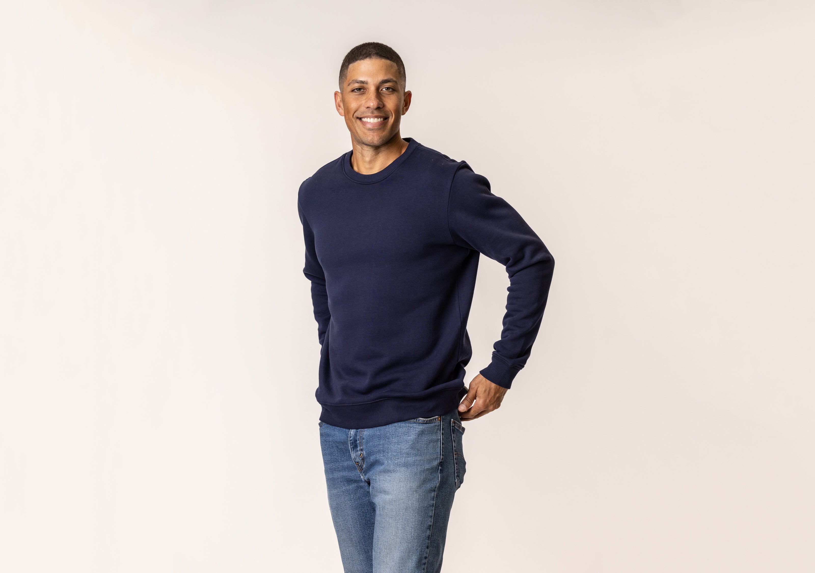 Man wearing a navy sweatshirt