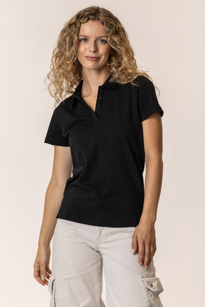 Woman wearing an organic cotton black polo shirt