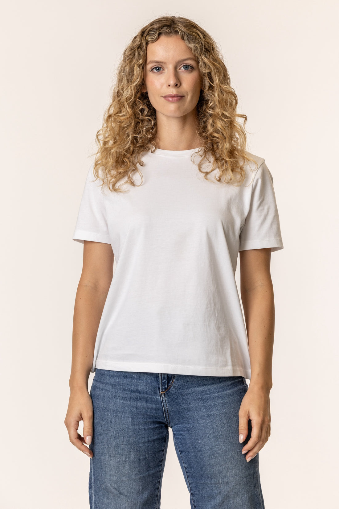 Woman wearing a plain white t-shirt 