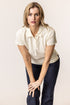 Woman wearing a womens polo shirt