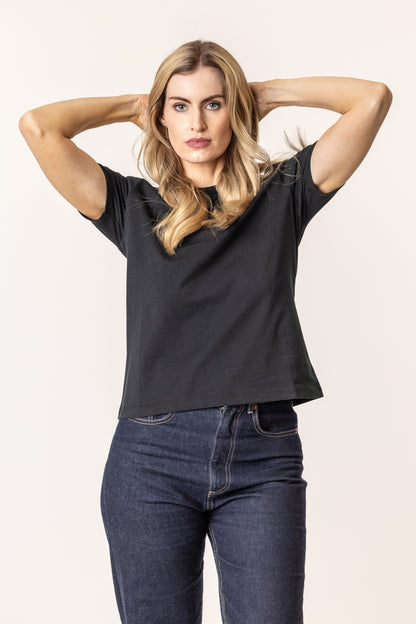 Woman wearing a black t-shirt